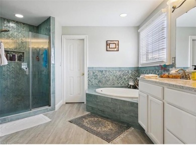 Step out of your home onto the 9th fairway.  This beautiful home on Riverfront Golf Club in Virginia - for sale on GolfHomes.com, golf home, golf lot