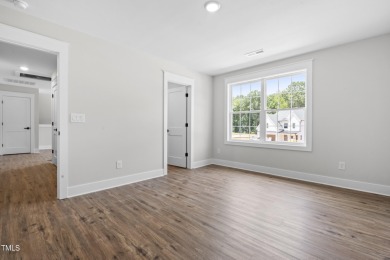 This stunning 4-bedroom, 2.5-bath home perfectly situated on a on Olde Liberty Golf and Country Club in North Carolina - for sale on GolfHomes.com, golf home, golf lot