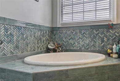 Step out of your home onto the 9th fairway.  This beautiful home on Riverfront Golf Club in Virginia - for sale on GolfHomes.com, golf home, golf lot