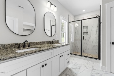 This stunning 4-bedroom, 2.5-bath home perfectly situated on a on Olde Liberty Golf and Country Club in North Carolina - for sale on GolfHomes.com, golf home, golf lot