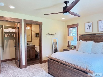 Stunning cabin in Island Park where rustic elegance meets on Island Park Village Resort Golf Course in Idaho - for sale on GolfHomes.com, golf home, golf lot