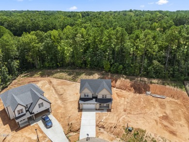 This stunning 4-bedroom, 2.5-bath home perfectly situated on a on Olde Liberty Golf and Country Club in North Carolina - for sale on GolfHomes.com, golf home, golf lot