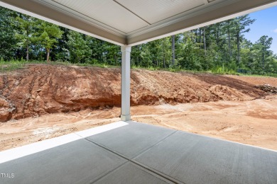 This stunning 4-bedroom, 2.5-bath home perfectly situated on a on Olde Liberty Golf and Country Club in North Carolina - for sale on GolfHomes.com, golf home, golf lot
