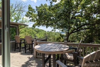 Located in the iconic Tan Tar A Estates, just steps from on The Oaks Golf Course in Missouri - for sale on GolfHomes.com, golf home, golf lot