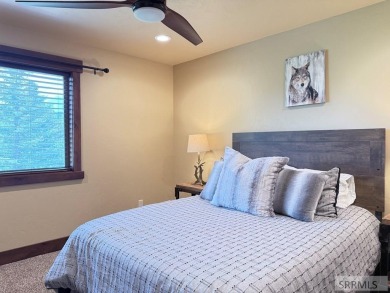 Stunning cabin in Island Park where rustic elegance meets on Island Park Village Resort Golf Course in Idaho - for sale on GolfHomes.com, golf home, golf lot
