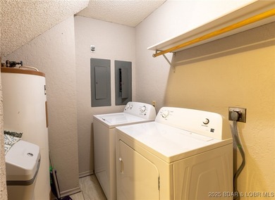 Located in the iconic Tan Tar A Estates, just steps from on The Oaks Golf Course in Missouri - for sale on GolfHomes.com, golf home, golf lot