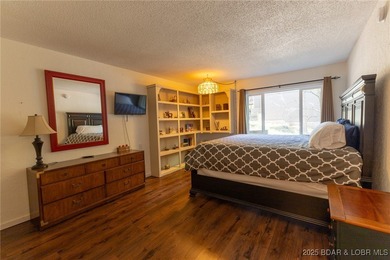 Located in the iconic Tan Tar A Estates, just steps from on The Oaks Golf Course in Missouri - for sale on GolfHomes.com, golf home, golf lot