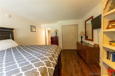 Located in the iconic Tan Tar A Estates, just steps from on The Oaks Golf Course in Missouri - for sale on GolfHomes.com, golf home, golf lot