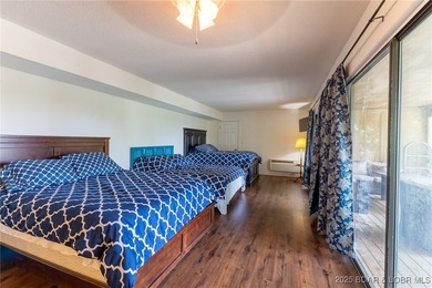 Located in the iconic Tan Tar A Estates, just steps from on The Oaks Golf Course in Missouri - for sale on GolfHomes.com, golf home, golf lot