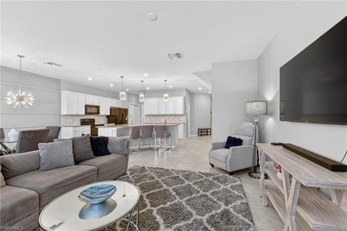 Welcome to this exceptional 3-bedroom, 2.5-bath lakeview on Gateway Golf and Country Club in Florida - for sale on GolfHomes.com, golf home, golf lot