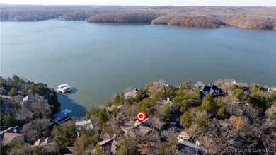 Located in the iconic Tan Tar A Estates, just steps from on The Oaks Golf Course in Missouri - for sale on GolfHomes.com, golf home, golf lot