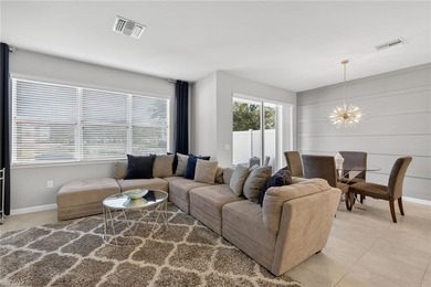 Welcome to this exceptional 3-bedroom, 2.5-bath lakeview on Gateway Golf and Country Club in Florida - for sale on GolfHomes.com, golf home, golf lot