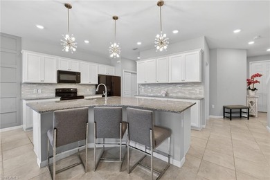 Welcome to this exceptional 3-bedroom, 2.5-bath lakeview on Gateway Golf and Country Club in Florida - for sale on GolfHomes.com, golf home, golf lot