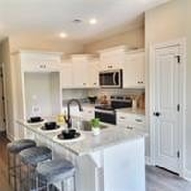 Dreaming of life on the golf course? The Rayon Plan makes that on Riverside Country Club in Alabama - for sale on GolfHomes.com, golf home, golf lot