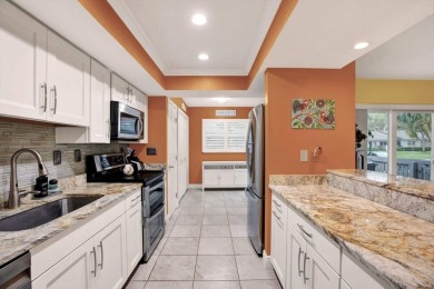 Under contract-accepting backup offers. Carefree Living in a on East Lake Woodlands Country Club in Florida - for sale on GolfHomes.com, golf home, golf lot