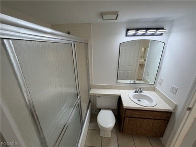 Solid concrete block duplex featuring two 2-bedroom, 2-bath on Estero Country Club in Florida - for sale on GolfHomes.com, golf home, golf lot