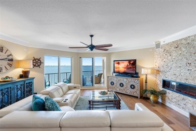 Welcome to Paradiso, a premier waterfront condominium nestled on Isla Del Sol Yacht and Country Club in Florida - for sale on GolfHomes.com, golf home, golf lot