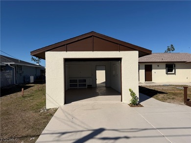 Solid concrete block duplex featuring two 2-bedroom, 2-bath on Estero Country Club in Florida - for sale on GolfHomes.com, golf home, golf lot