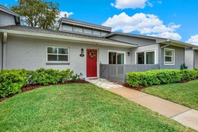 Under contract-accepting backup offers. Carefree Living in a on East Lake Woodlands Country Club in Florida - for sale on GolfHomes.com, golf home, golf lot