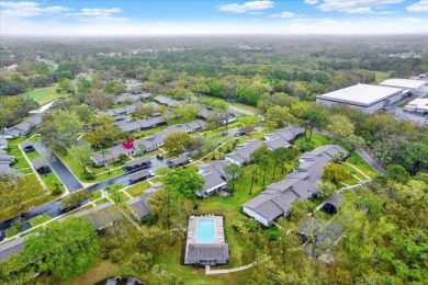 Under contract-accepting backup offers. Carefree Living in a on East Lake Woodlands Country Club in Florida - for sale on GolfHomes.com, golf home, golf lot