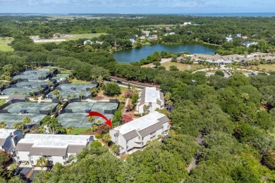 Charming First-Floor Villa Overlooking the Racquet Club on on The Seabrook Island Club in South Carolina - for sale on GolfHomes.com, golf home, golf lot