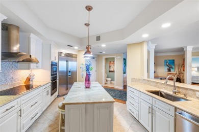 Welcome to Paradiso, a premier waterfront condominium nestled on Isla Del Sol Yacht and Country Club in Florida - for sale on GolfHomes.com, golf home, golf lot