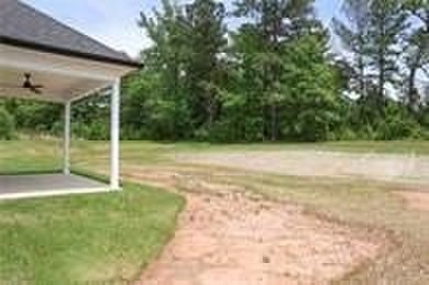 Dreaming of life on the golf course? The Rayon Plan makes that on Riverside Country Club in Alabama - for sale on GolfHomes.com, golf home, golf lot