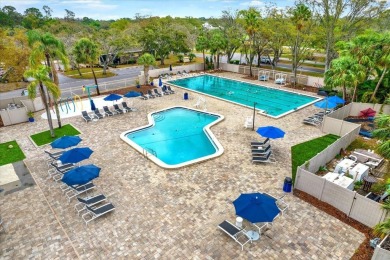 Under contract-accepting backup offers. Carefree Living in a on East Lake Woodlands Country Club in Florida - for sale on GolfHomes.com, golf home, golf lot