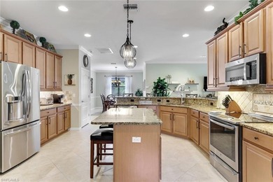 Discover refined Florida living in this beautifully appointed on The Rookery At Marco in Florida - for sale on GolfHomes.com, golf home, golf lot