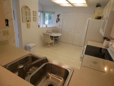 This beautiful 2-bedroom, 2-bath condo in the Eagleswood section on Beacon Woods Golf Club in Florida - for sale on GolfHomes.com, golf home, golf lot