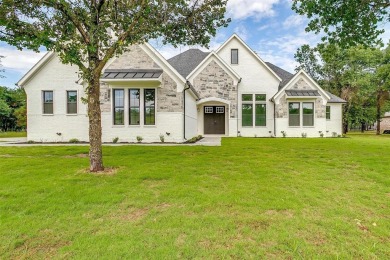 A beautifully built customized home in the amazing neighborhood on Sugar Tree Golf and Country Club in Texas - for sale on GolfHomes.com, golf home, golf lot