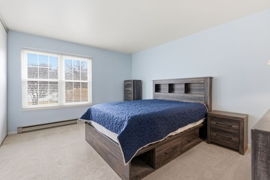 This desirable end-unit offers comfortable single-level living on Leisure Village Golf Course in Illinois - for sale on GolfHomes.com, golf home, golf lot