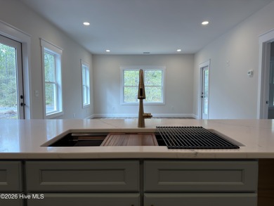 New construction by Brunswick Sustainable Living offering on The Lakes Country Club in North Carolina - for sale on GolfHomes.com, golf home, golf lot