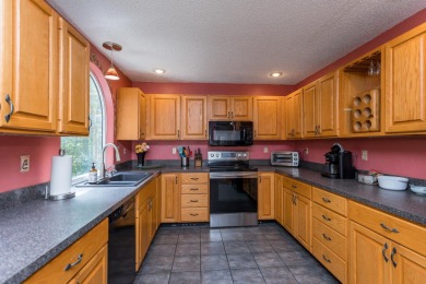 A contemporary design infused with mountain comfort, this on Woodstone Meadows Golf Course At Massanutten in Virginia - for sale on GolfHomes.com, golf home, golf lot
