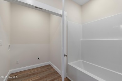 New construction by Brunswick Sustainable Living offering on The Lakes Country Club in North Carolina - for sale on GolfHomes.com, golf home, golf lot