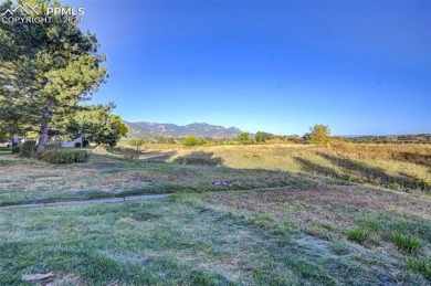 Nestled at the foot of Cheyenne Mountain in a prime location on Country Club of Colorado in Colorado - for sale on GolfHomes.com, golf home, golf lot