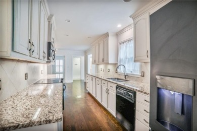 Completely updated move-in ready home in fantastic neighborhood on TPC At Sugarloaf Golf Club in Georgia - for sale on GolfHomes.com, golf home, golf lot