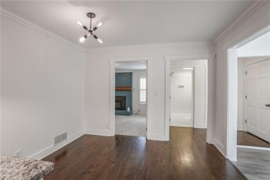 Completely updated move-in ready home in fantastic neighborhood on TPC At Sugarloaf Golf Club in Georgia - for sale on GolfHomes.com, golf home, golf lot