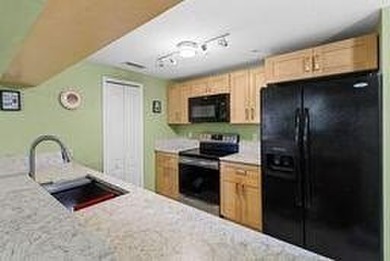 Don't miss this 1st floor unit on the 3rd hole of Gator Trace on Gator Trace Golf and Country Club in Florida - for sale on GolfHomes.com, golf home, golf lot