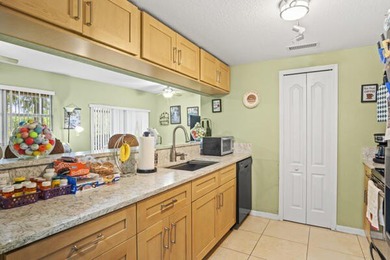 Don't miss this 1st floor unit on the 3rd hole of Gator Trace on Gator Trace Golf and Country Club in Florida - for sale on GolfHomes.com, golf home, golf lot