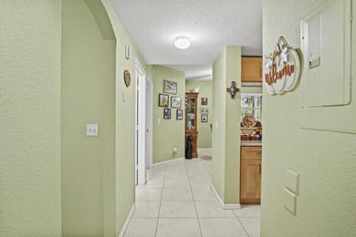 Don't miss this 1st floor unit on the 3rd hole of Gator Trace on Gator Trace Golf and Country Club in Florida - for sale on GolfHomes.com, golf home, golf lot