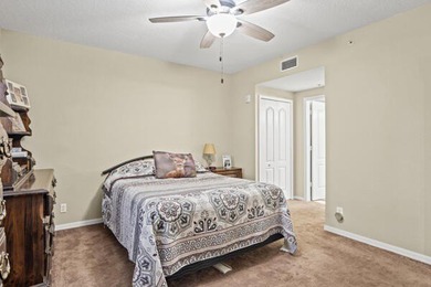 Don't miss this 1st floor unit on the 3rd hole of Gator Trace on Gator Trace Golf and Country Club in Florida - for sale on GolfHomes.com, golf home, golf lot