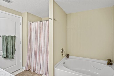 Don't miss this 1st floor unit on the 3rd hole of Gator Trace on Gator Trace Golf and Country Club in Florida - for sale on GolfHomes.com, golf home, golf lot