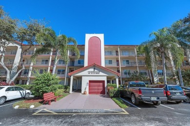 Experience luxury living in this stunning, top-floor corner unit on Flamingo Lakes Country Club in Florida - for sale on GolfHomes.com, golf home, golf lot