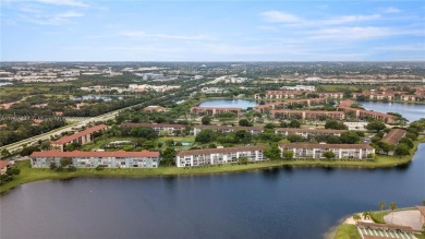 Experience luxury living in this stunning, top-floor corner unit on Flamingo Lakes Country Club in Florida - for sale on GolfHomes.com, golf home, golf lot