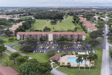 Experience luxury living in this stunning, top-floor corner unit on Flamingo Lakes Country Club in Florida - for sale on GolfHomes.com, golf home, golf lot