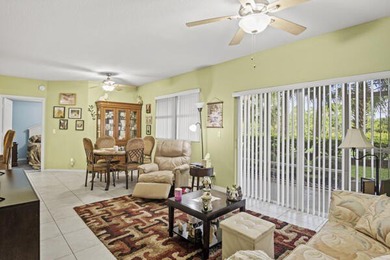 Don't miss this 1st floor unit on the 3rd hole of Gator Trace on Gator Trace Golf and Country Club in Florida - for sale on GolfHomes.com, golf home, golf lot