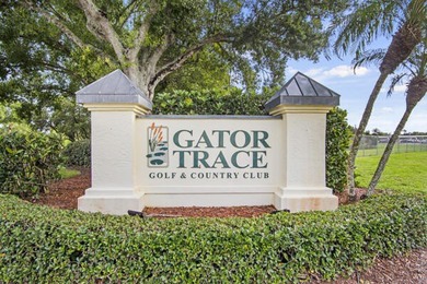 Don't miss this 1st floor unit on the 3rd hole of Gator Trace on Gator Trace Golf and Country Club in Florida - for sale on GolfHomes.com, golf home, golf lot