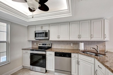 This corner unit is truly exceptional, boasting a prime location on Riverbend Golf Club in Florida - for sale on GolfHomes.com, golf home, golf lot