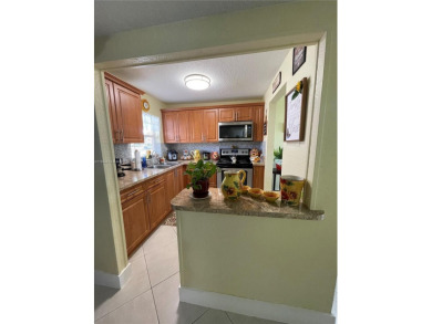 Beautiful and completely remodeled one bedroom in na 55+ on Sunrise Lakes Phase IV Golf Course in Florida - for sale on GolfHomes.com, golf home, golf lot